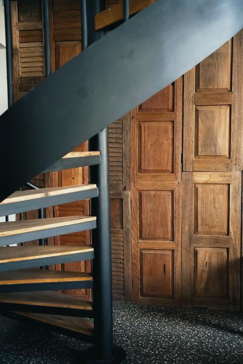 Spiral stair and carved doors